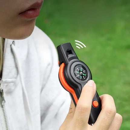 7-in-1 Survival Whistle – LED, Compass, Thermometer for Camping!